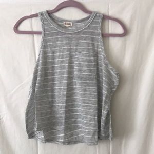 Grey and white striped tank top with pocket.
